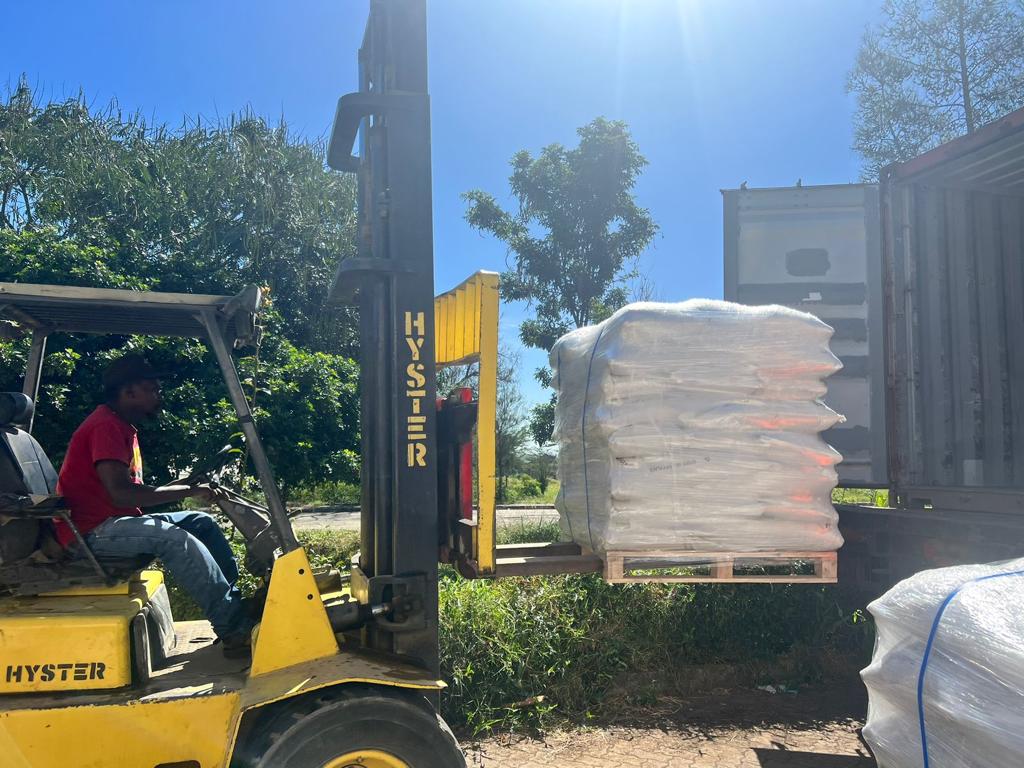 Forklift handling palletised gum arabic bags at the Acacia EPZ facility in Athi River